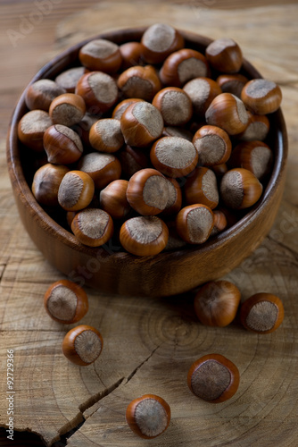 Cobnuts in a wooden bowl, close-up, selective focus