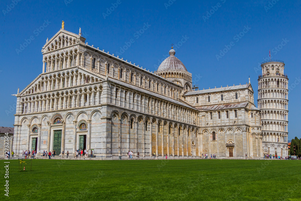 Leaning tower and Pisa cathedral in a summer day in Pisa, Italy