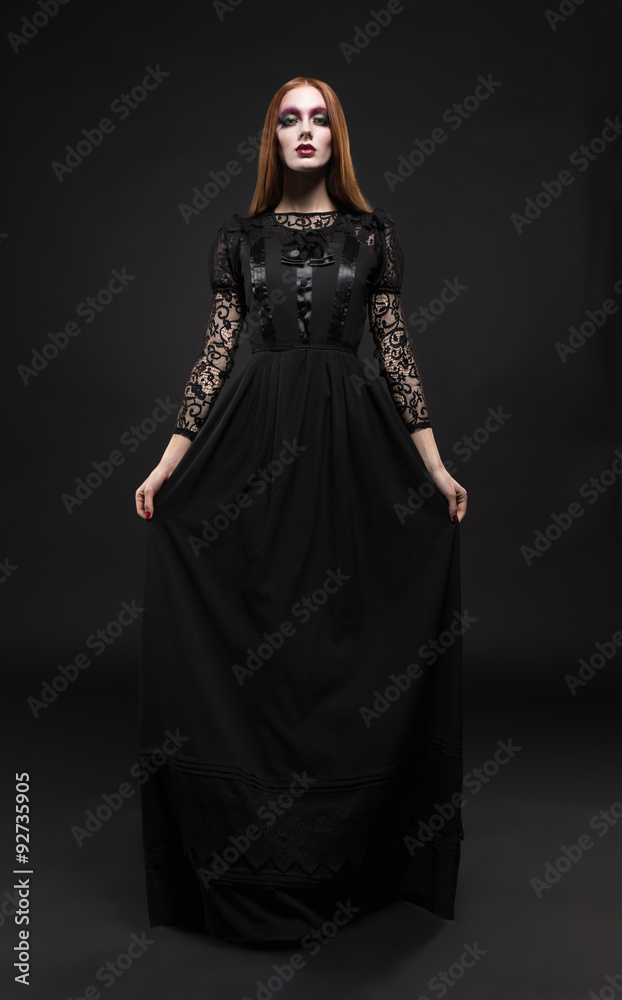 Portrait of gothic girl with black eyes in dark clothes Portrait of gothic girl with black eyes in dark clothes