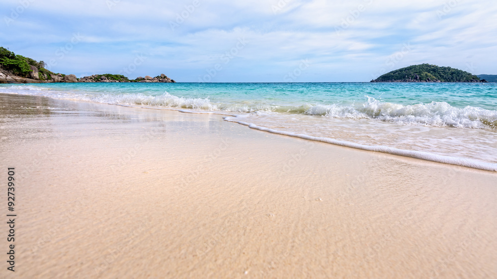 Beautiful landscape blue sea white sand and waves on the beach during summer at Koh Miang island in Mu Ko Similan National Park, Phang Nga province, Thailand, 16:9 widescreen