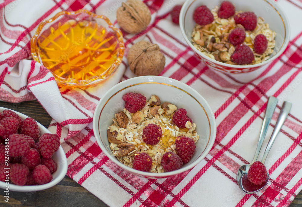Homemade granola with raspberries, walnuts and honey Homemade granola with raspberries, walnuts and honey