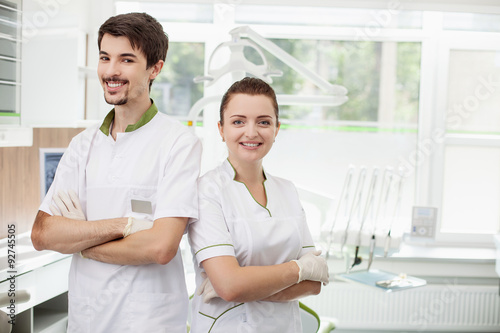 Professional young dentists are working in lab