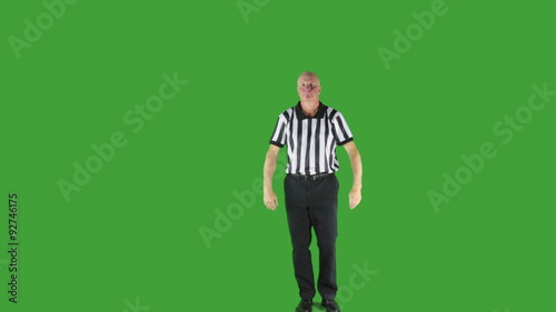 Man dressed in basketball referee uniform signaling Technical Foul.
