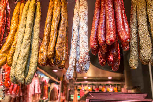 Photography Catalan dry sausages called fuet at Mercat de Sant Josep de la Boqueria market i