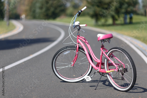 Bicycle standing on the road