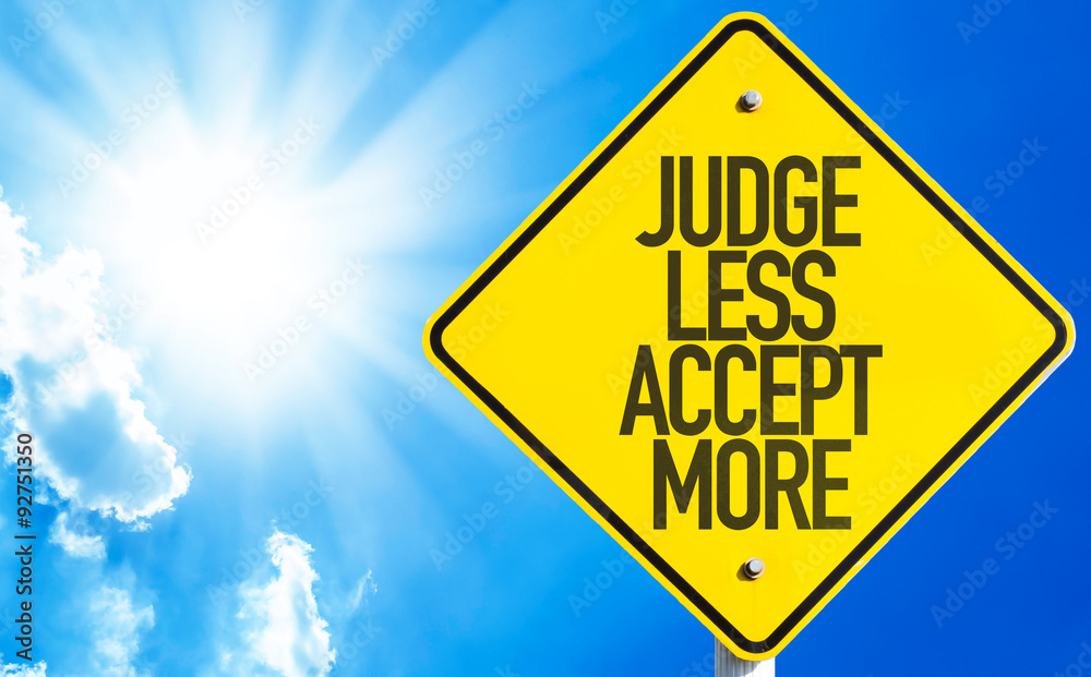 Judge Less Accept More sign with sky background