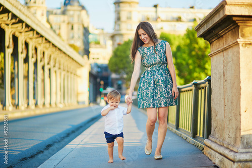 Young mother with her little son in Paris