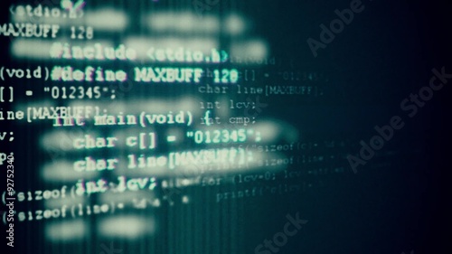  Programming code running down a computer screen terminal