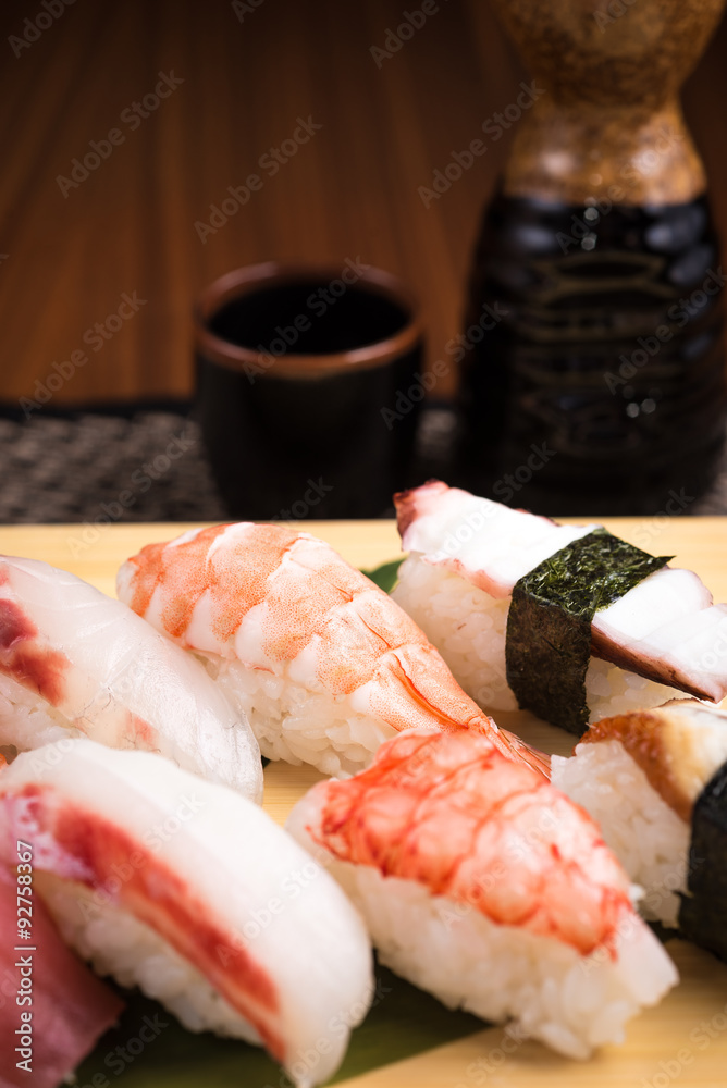 fresh nigiri sushi in a plate in a japanese restaurant fresh nigiri sushi in a plate in a japanese restaurant