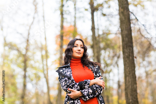  girl student walking in the autumn park