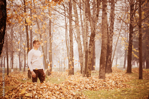 young men in autumn park © Maya Kruchancova
