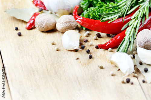 Fototapeta Naklejka Na Ścianę i Meble -  Garlic, nutmeg, rosemary and chili pepper