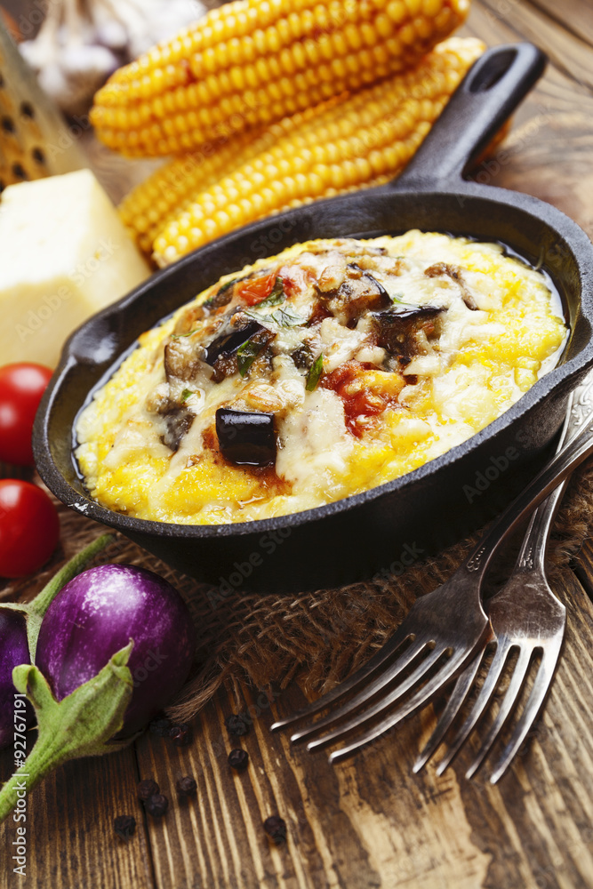 Polenta baked with vegetables and cheese