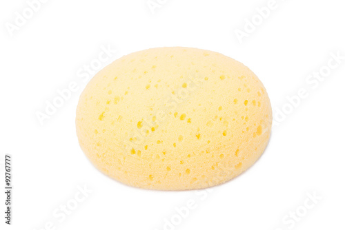 round yellow natural facial cellulose sponge isolated on white b