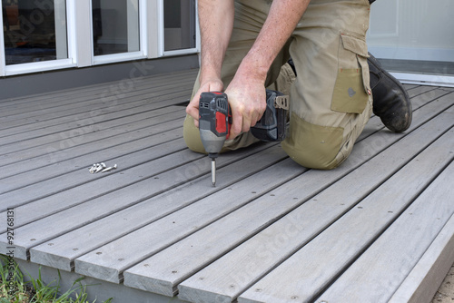 Tradesman screws in new composite decking at home