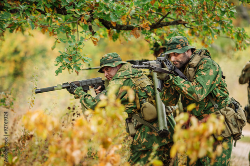 Russian special forces operator in the battlefield with a rifle photo