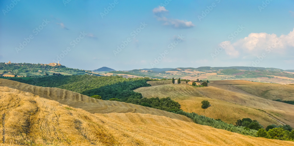 Tuscany landscape with rolling hills at sunset, Val d'Orcia, Italy