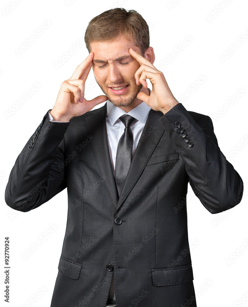 Tired businessman at work in office