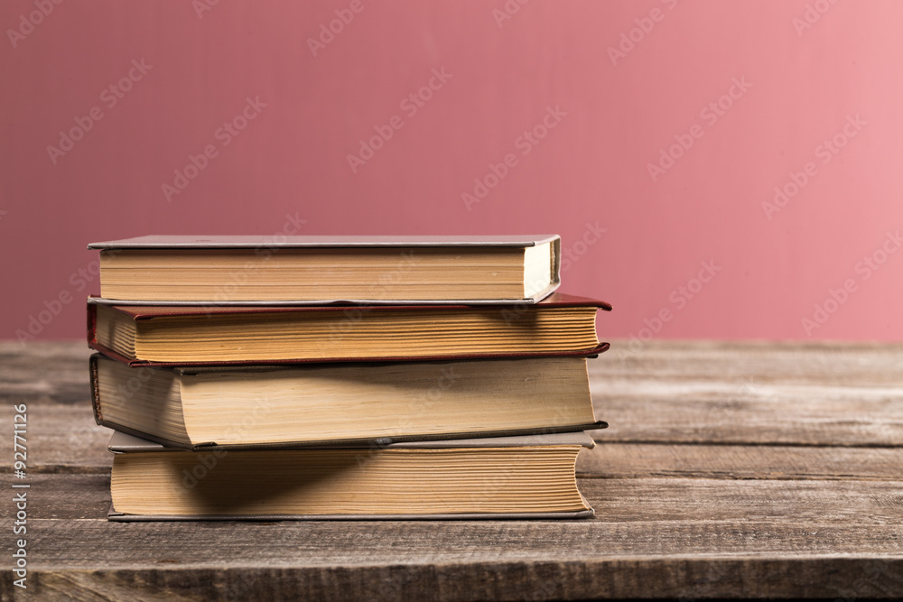 Retro books on wooden desk Retro books on wooden desk