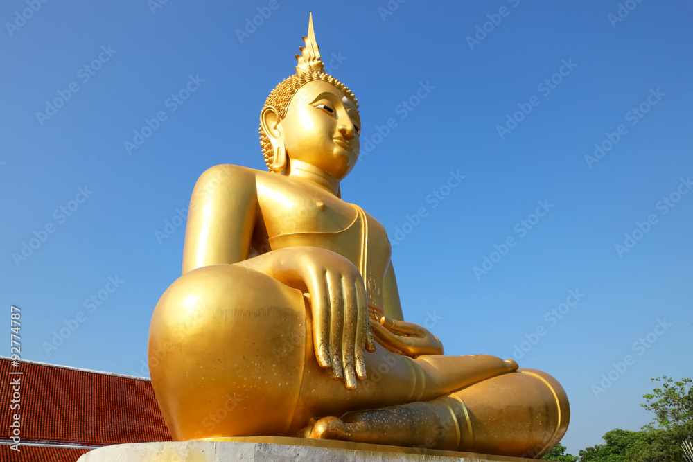 The big golden Buddha statue at temple Kanchanaburi, Thailand The big golden Buddha statue at temple Kanchanaburi, Thailand