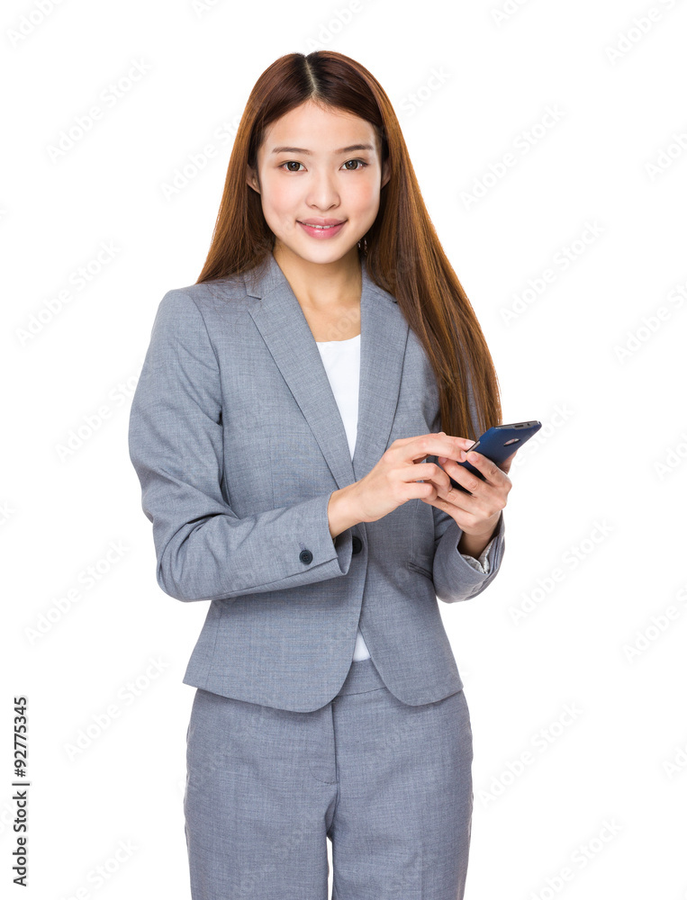 Asian businesswoman use of the cellphone Asian businesswoman use of the cellphone