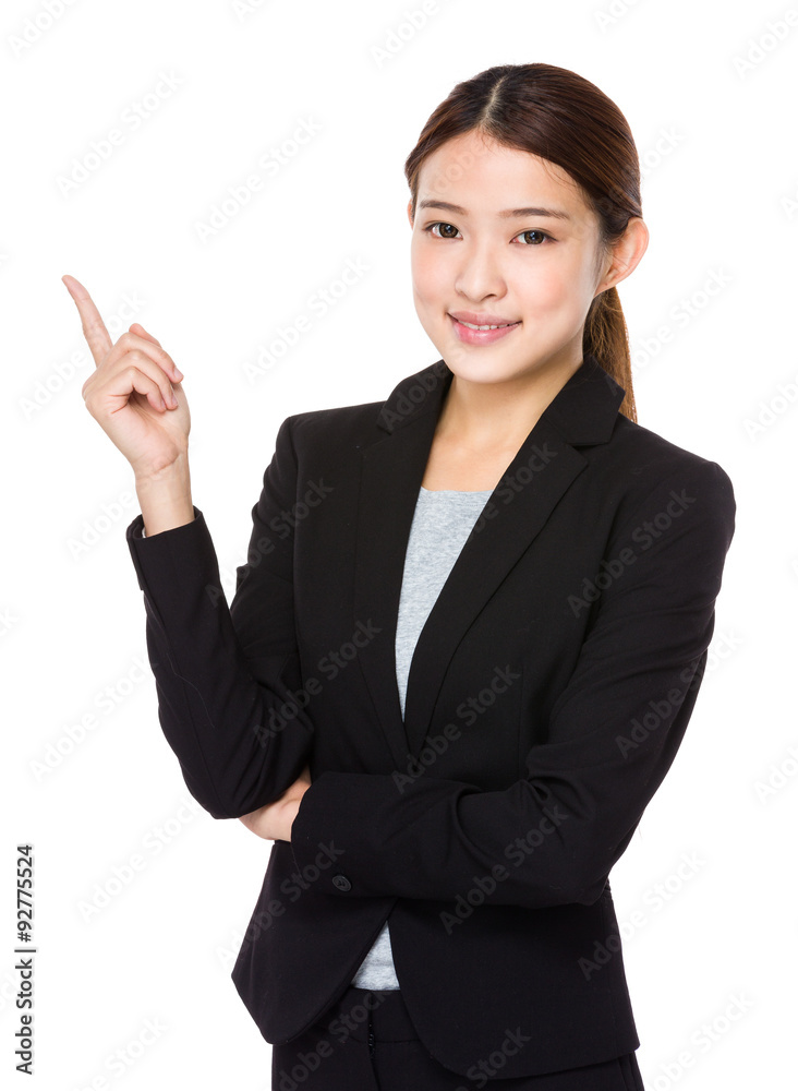 Young businesswoman with finger point up Young businesswoman with finger point up