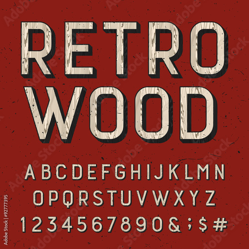 Wooden retro alphabet vector font. Sans serif type letters, numbers and symbols on the red distressed background. Vintage vector typography for labels, headlines, posters etc.