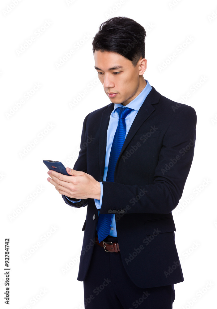 Businessman read on the cellphone Businessman read on the cellphone
