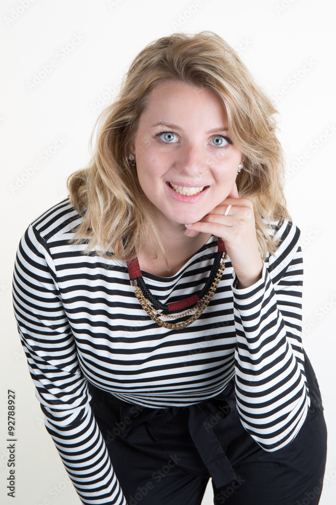 Blond young and sexy woman posing for the camera isolated under white background Blond young and sexy woman posing for the camera isolated under white background