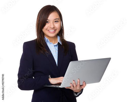 Asian businesswoman use of the notebook computer © leungchopan