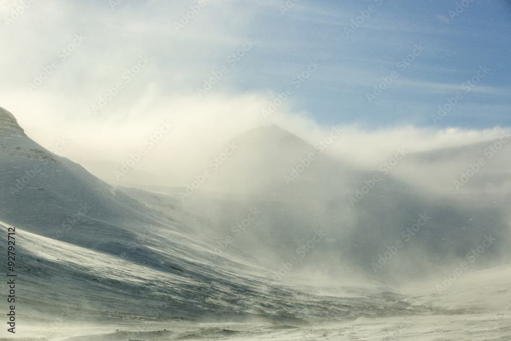 Snow-covered volcanic mountain landscape