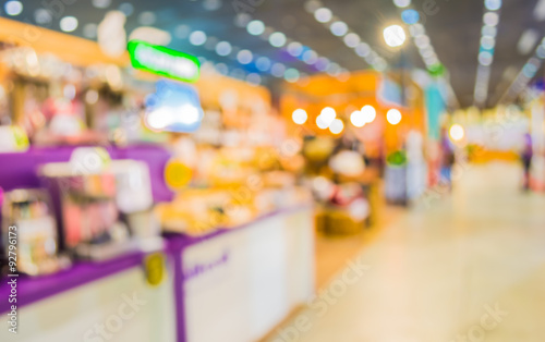 blurred image of people at trade show