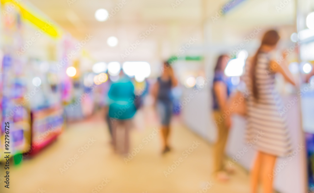 blurred image of people at shopping mall