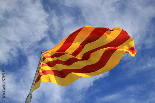BARCELONA, CATALONIA, SPAIN - AUGUST 31, 2012: Catalan flag fluttering in the wind