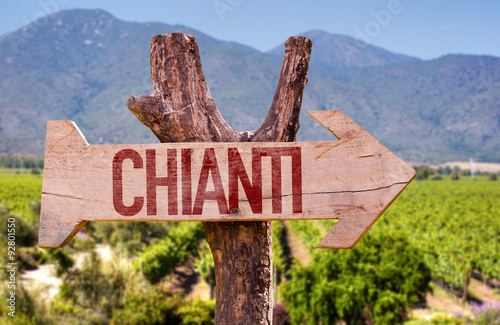 Chianti wooden sign with winery background photo
