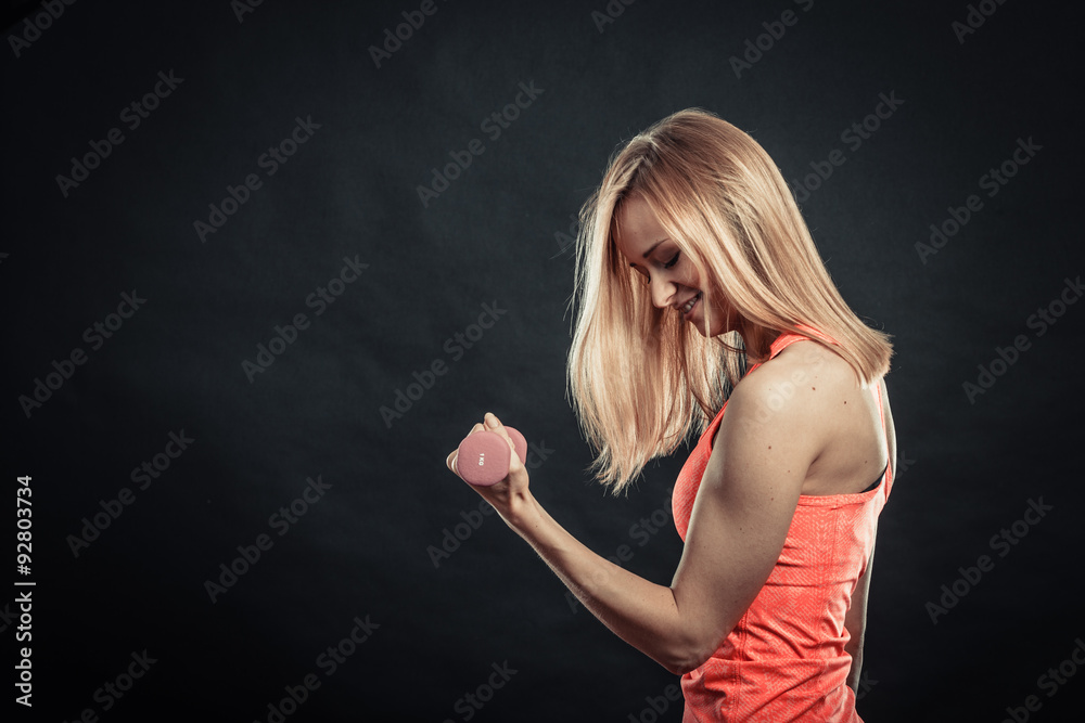 Fitness sporty girl lifting weights Fitness sporty girl lifting weights