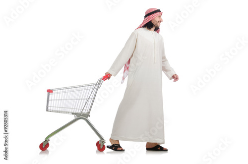 Arab man doing shopping isolated on white © Elnur