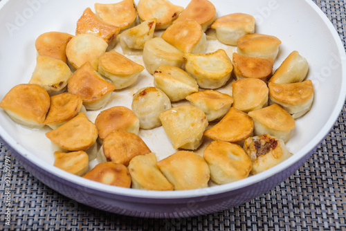 Fried dumplings in the pan