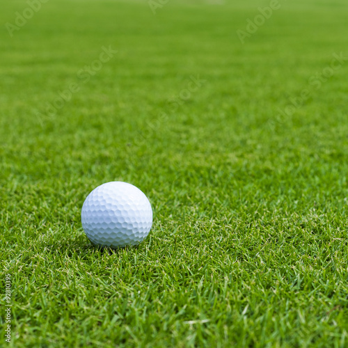 Golf ball on green