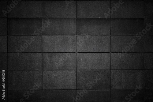 Textured black grunge concrete background