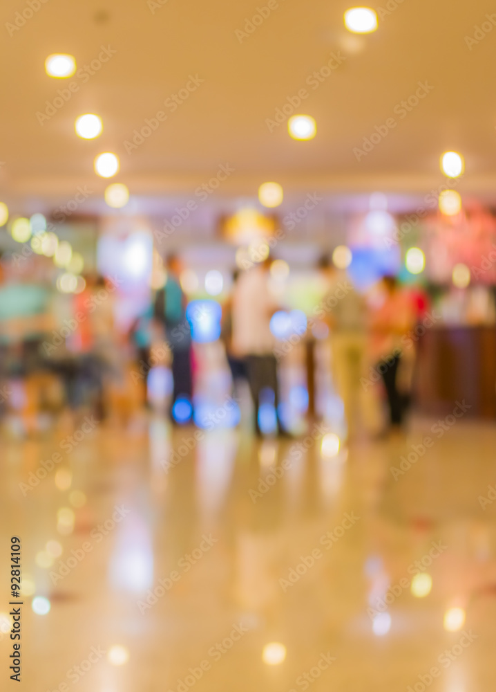blur image of Long empty corridor on night time with bokeh.