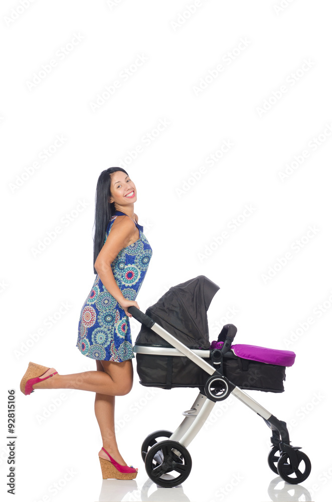 Happy mom with her baby in pram 