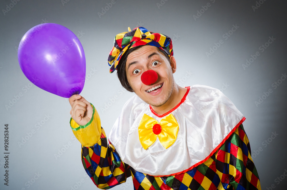 Funny clown in comical concept Funny clown in comical concept