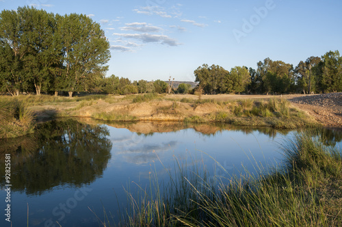 The Bullaque River at its pass through Porzuna, La Mancha, Ciudad Real, Spain photo