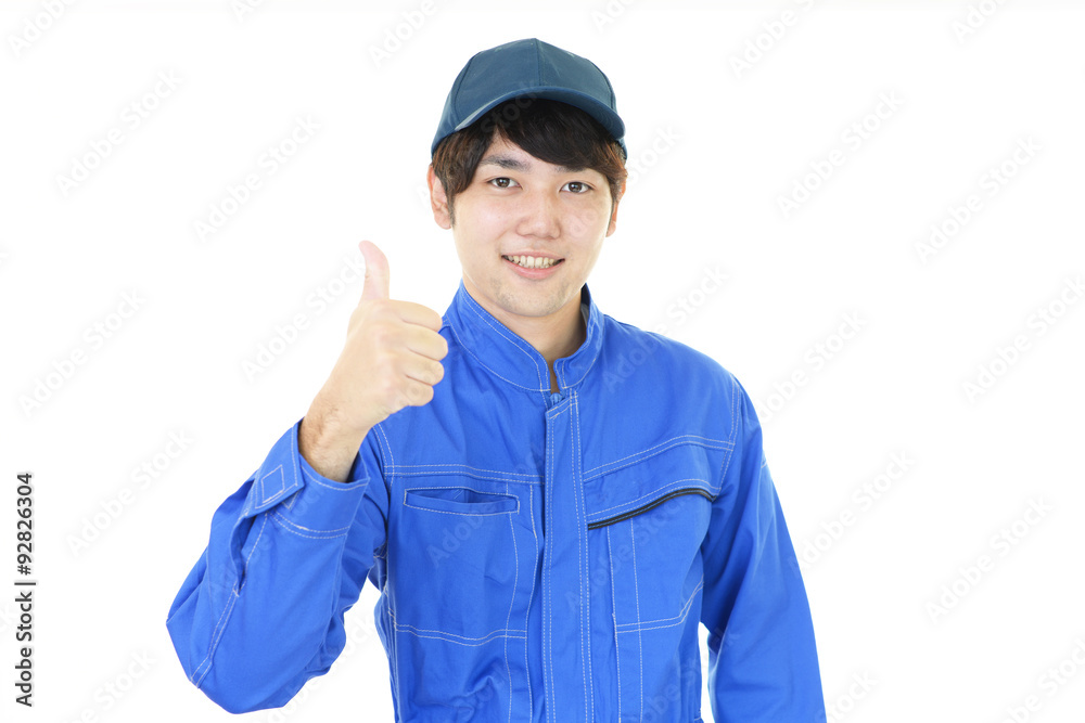 ガッツポーズの作業員