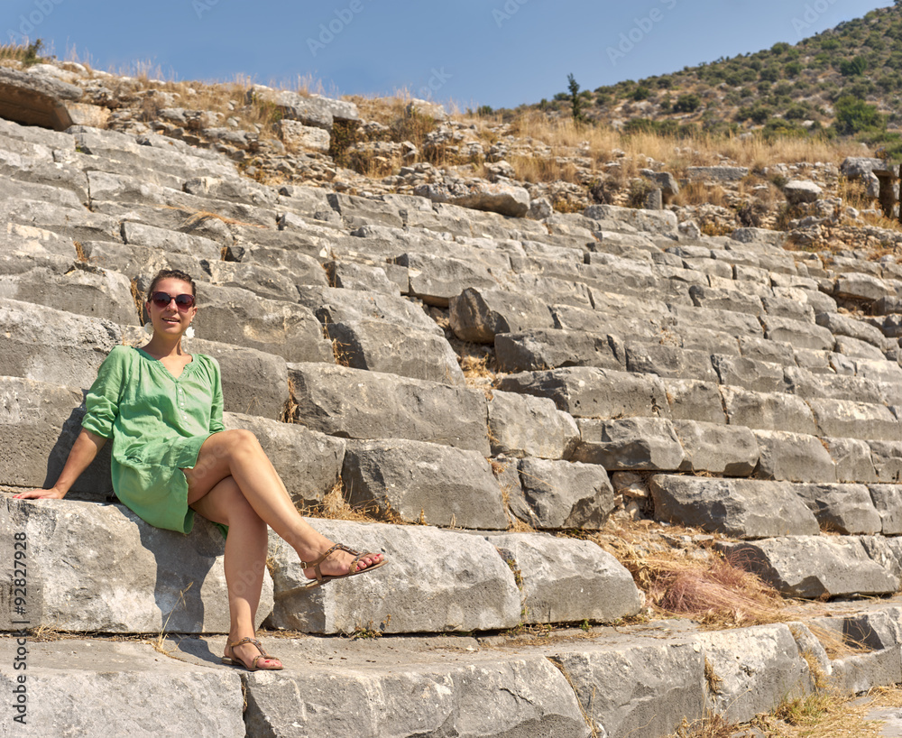 beautiful woman on the ruins of the Colosseum. Turkey, Kemer.