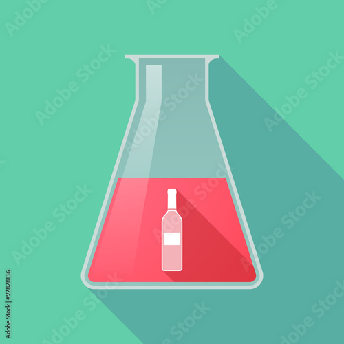 Long shadow chemical test tube flask with a bottle of wine