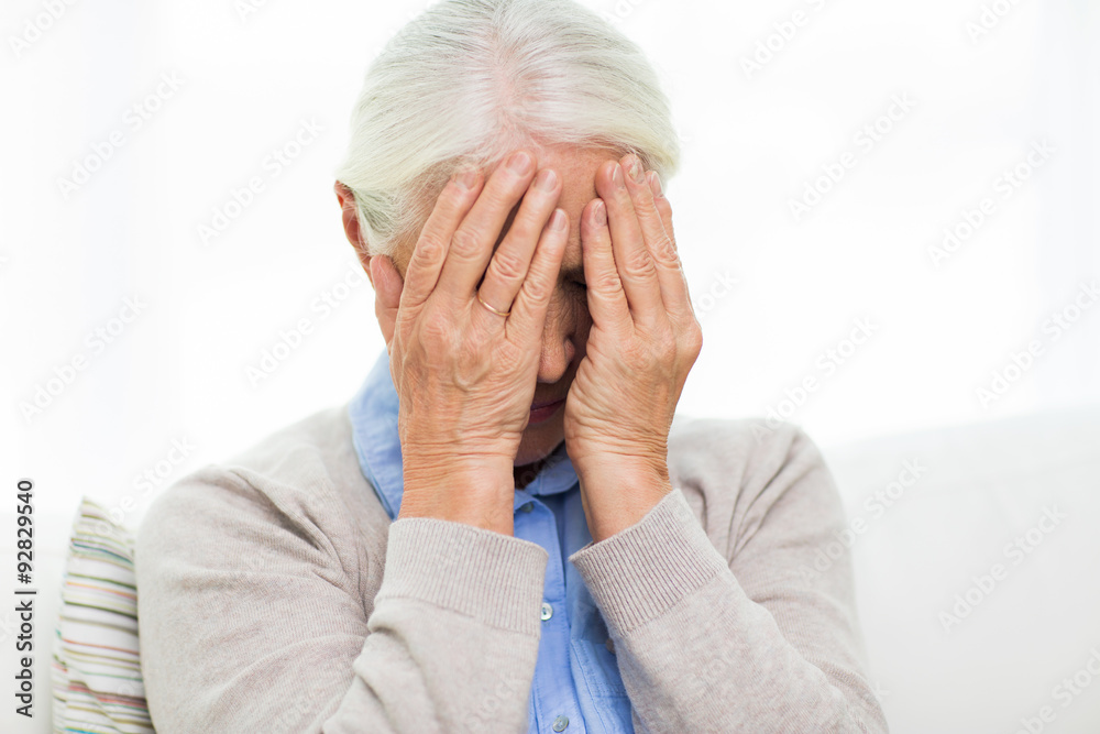 senior woman suffering from headache or grief senior woman suffering from headache or grief