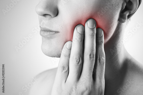 Man with a toothache. Pain in the human body