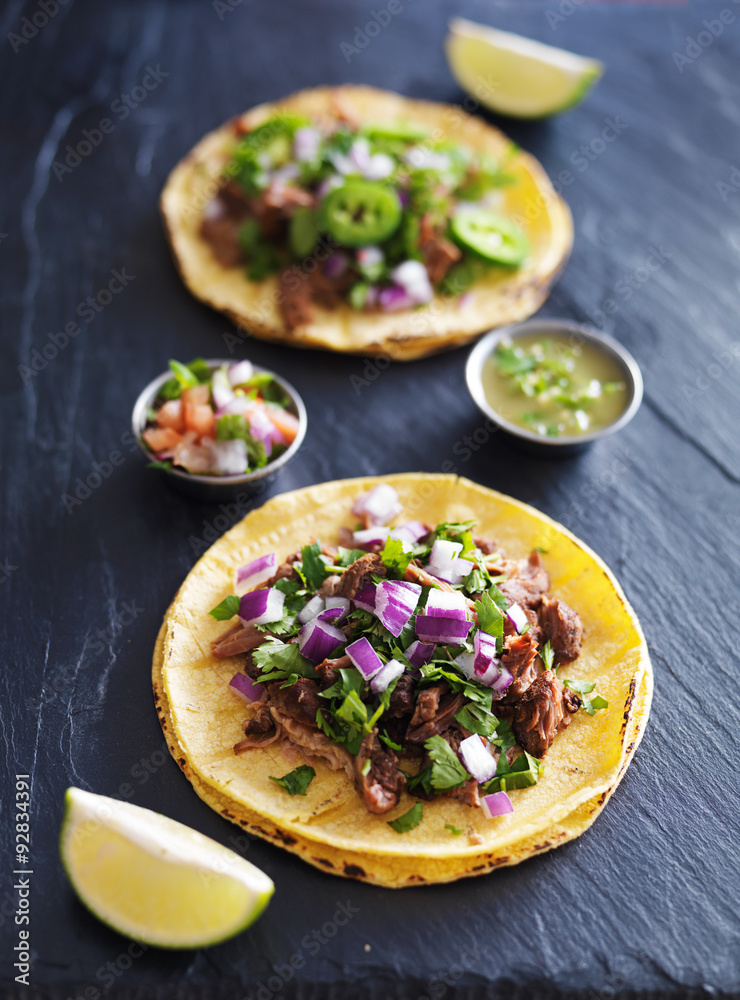 two authentic mexican street tacos with barbacoa beef